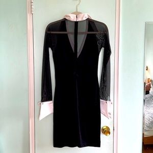 Cocktail dress w mesh sleeves & back. Jeweled buttons. L 35-1/2 in waist 27 in